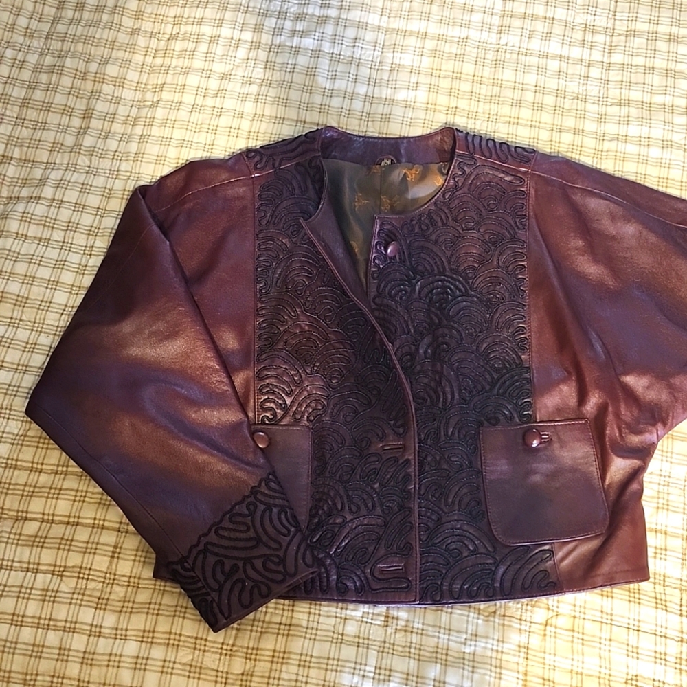 Leather batwing jacket with embroidered stiching